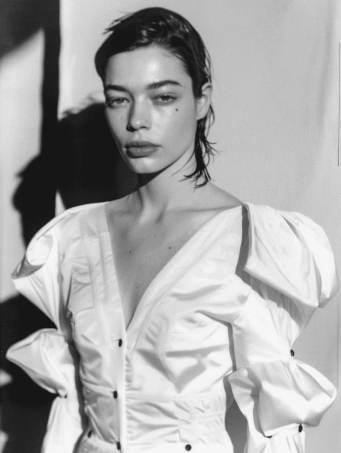 A portrait sitting lit by a single window